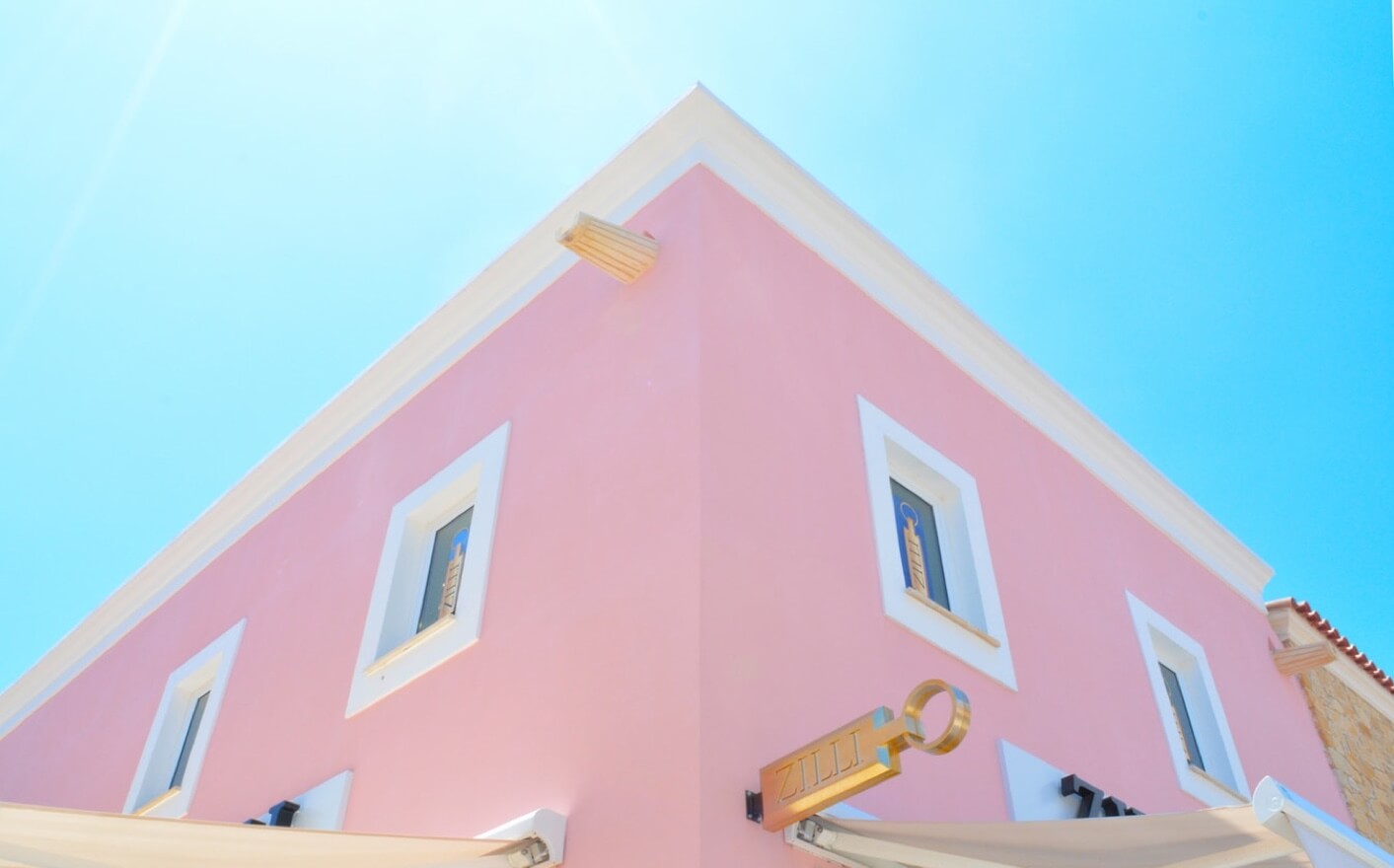 pink house and blue sky